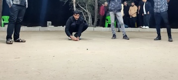 گزارش تصویری / افتتاح لیگ بازی محلی هِل (تیله) در شهرستان لامِرد