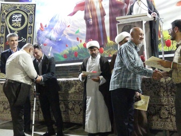 تجلیل از پیرغلامان حسینی در آیین «راه زینب (س)» شهرستان مُهر /عکاس زهرا صالحی
