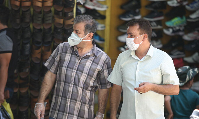 سازمان جهانی بهداشت: لزوم استفاده ماسک در اماکن عمومی